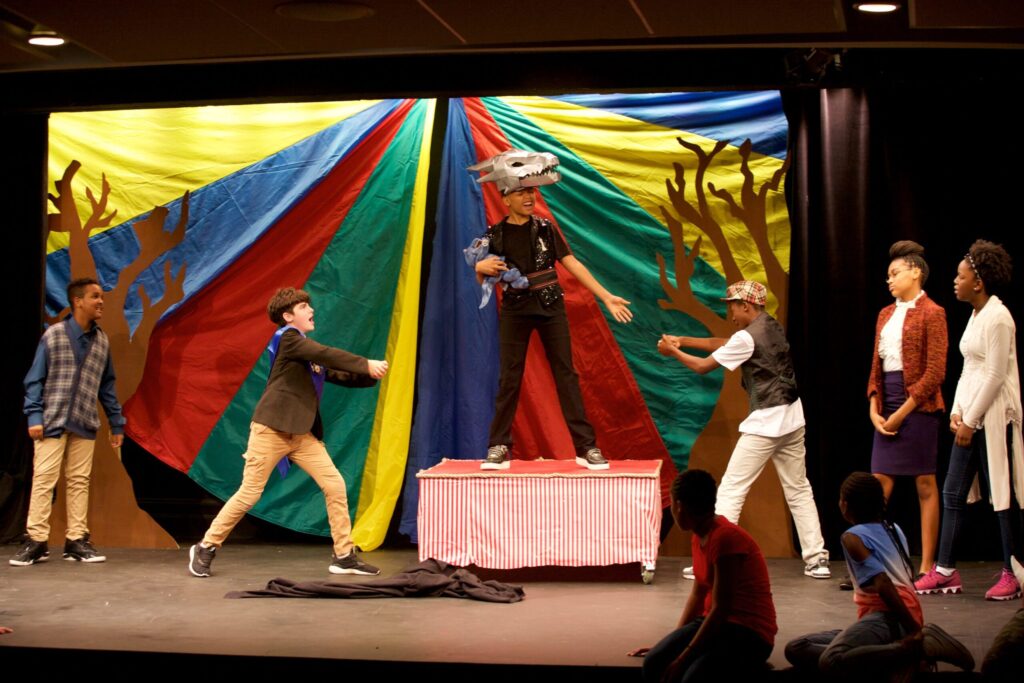 Children on stage in a circus scene